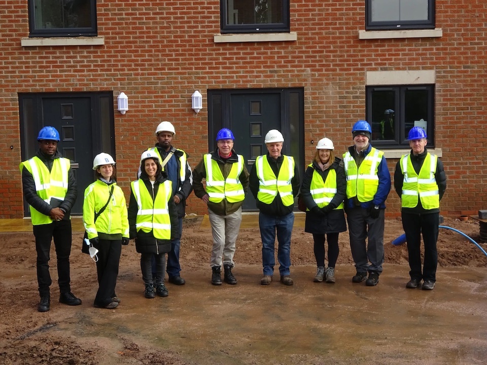 team-on-site-visit-scaled